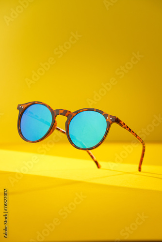 Trendy sunglasses background. Fashion summer accessories. Copy space for text. Black white concept. Optic store discount poster