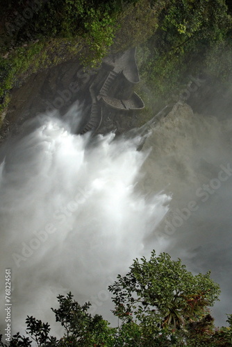 Fototapeta Naklejka Na Ścianę i Meble -  Lookout point above the pool below the Pailon del Diablo Waterfall on the Pastaza River, surrounded by mist, in Rio Verde, outside of Banos, Ecuador