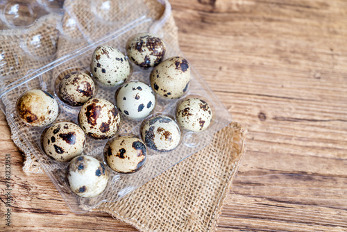 Quail Eggs on wooden background