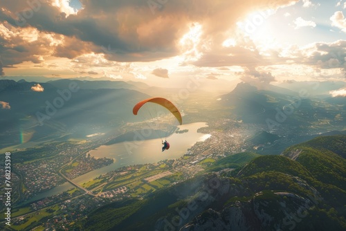 Happy paragliders flying on a paraglider, aerial view of flying paragliders