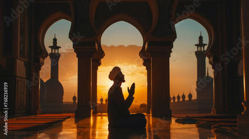 Man in prayer at sunset in mosque arches, embodying Muslim traditions of Ramadan, Eid al-Fitr, and Eid al-Adha for design and print