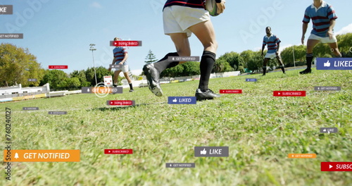 Image of social media notifications over caucasian male rugby players in match