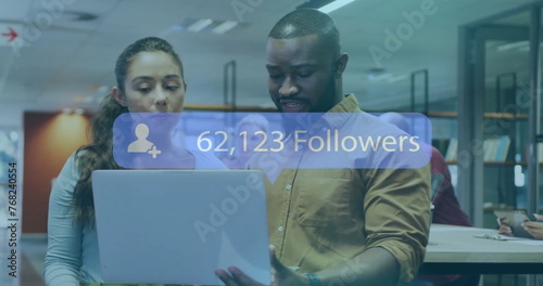 Image of followers text and data processing over diverse business people in office