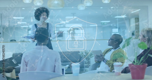 Image of padlock and data processing over diverse business people in office