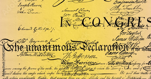 Digital image of written constitution of the United States moving in the screen against yellow and b