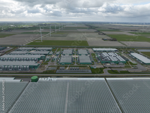 Data center, computing center facility business critical IT equipment servers housed. Artificial intelligence and internet infrastructure. Aerial drone view. The Netherlands.