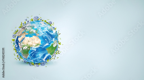 Earth day illustration planet earth with green branches and flowers on blue studio background with copy space, nature eco theme holiday banner