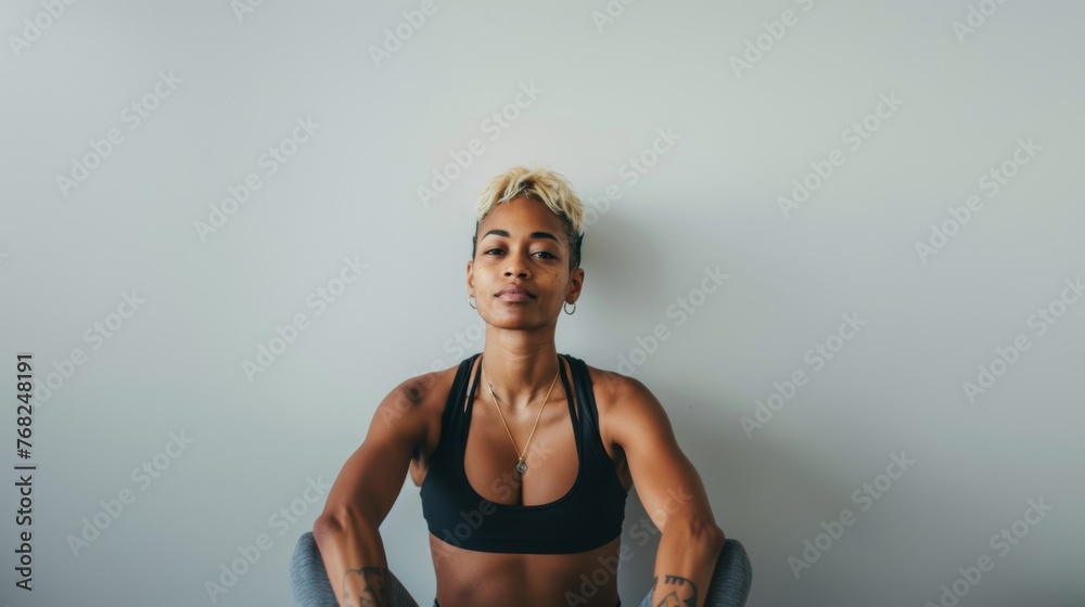Attractive woman with a fashionable hairstyle in stylish sportswear. Fashion and beauty, active lifestyle and sports. Attractive woman with a fashionable hairstyle in stylish sportswear. Fashion and beauty, active lifestyle and sports.