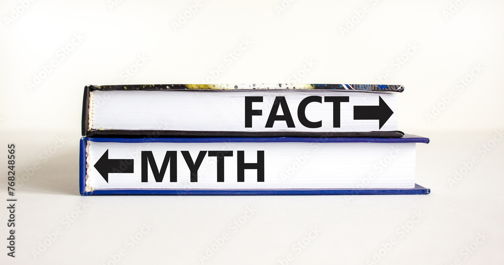 Fact or myth symbol. Concept word Myth and Fact on beautiful books. Beautiful white table white background. Business and fact or myth concept. Copy space.