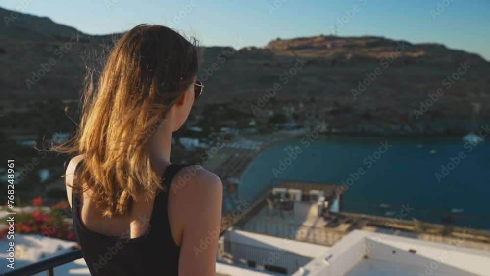 Girl on the balcony. Travel and vacation concept. Girl on the balcony. Travel and vacation concept.
