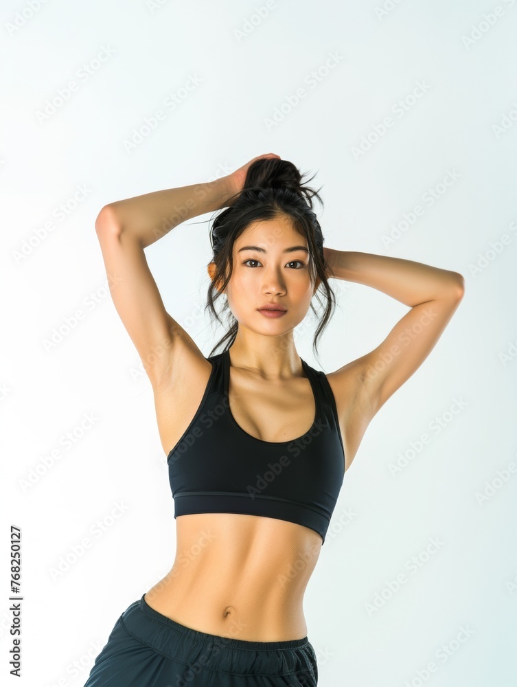 Attractive woman with a fashionable hairstyle in stylish sportswear. Fashion and beauty, active lifestyle and sports. Attractive woman with a fashionable hairstyle in stylish sportswear. Fashion and beauty, active lifestyle and sports.