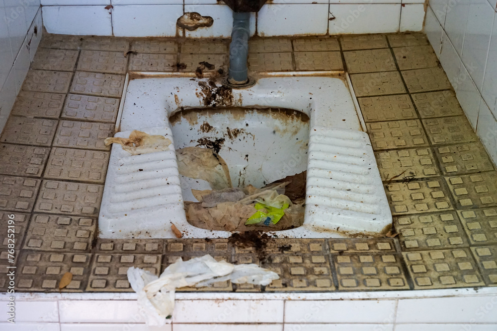 Disgusting dirty wc squat toilet in french city Avignon, France