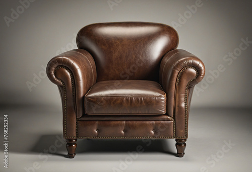 a brown distressed leather club chair 
