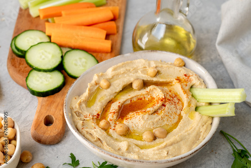 Принти на полотні healthy snack fresh hummus with paprika with celery, carrots, cucumber, with chi