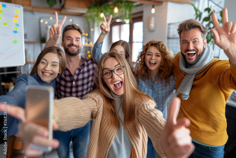 An energetic group of colleagues from the marketing department share a joyful selfie moment, with an enthusiastic nod of approval in a cozy office environment. Successful strategies. An energetic group of colleagues from the marketing department share a joyful selfie moment, with an enthusiastic nod of approval in a cozy office environment. Successful strategies.