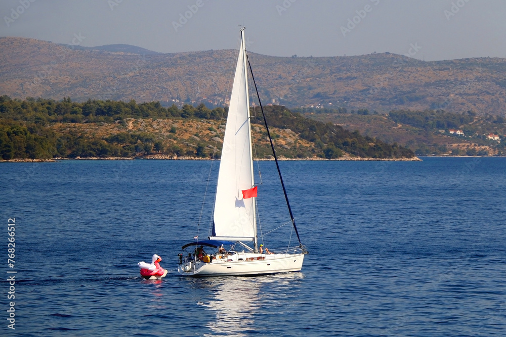 Naklejka premium Sailing boat and beautiful Adriatic sea landscape in Croatia.