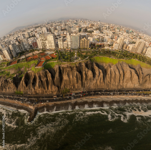 Panoramic image of the city of Lima. You can appreciate the buildings of Miraflores, the Malecon parks, the cliff, the Costa Verde highway and the coast of the Pacific Ocean.