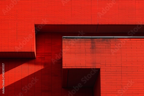 geometric red brick wall with dark shadows