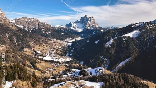 Aerial panoramic view of the Dolomite Mountains in early winter, Italy photo