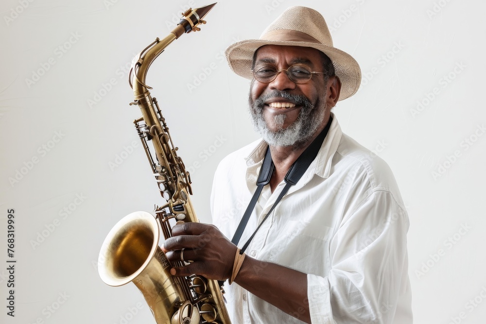 Fototapeta premium Experienced jazz musician smiling while holding a saxophone ready to play