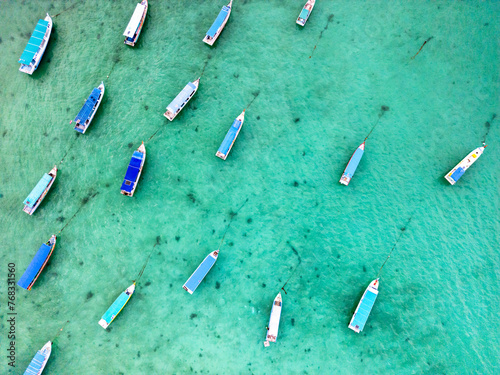 tourist boats on tropical sea in Belitung, Indonesia, drone aerial top down view