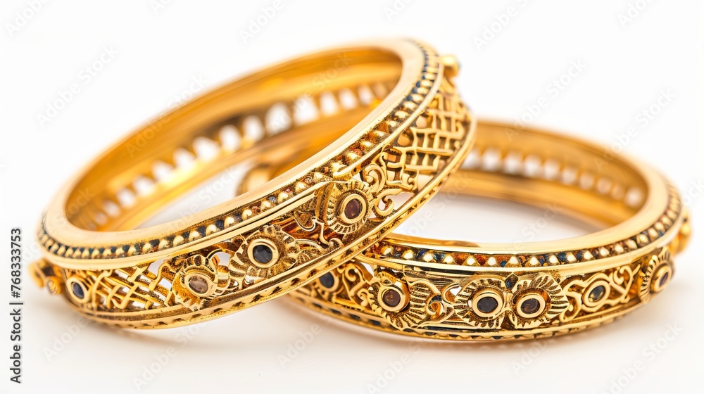 Decorative Indian design gold bangles, illustrating the craftsmanship and elegance of Indian jewelry Decorative Indian design gold bangles, illustrating the craftsmanship and elegance of Indian jewelry