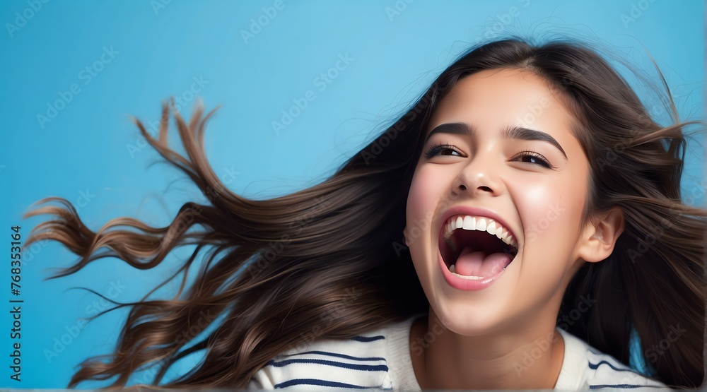 young hispanic teenage girl on plain bright blue background laughing hysterically looking at camera background banner template ad marketing concept from Generative AI young hispanic teenage girl on plain bright blue background laughing hysterically looking at camera background banner template ad marketing concept from Generative AI