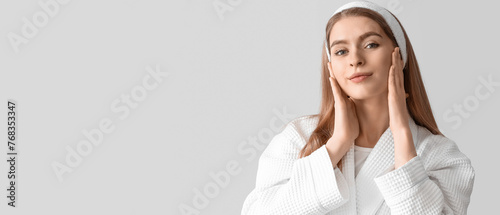 Young woman doing face buil...