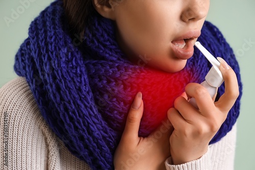 Ill young woman with inhale...