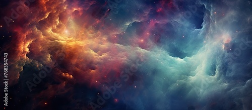 Vibrant hues of a nebula shine in a cosmic scene with stars and swirling clouds in the vast galaxy