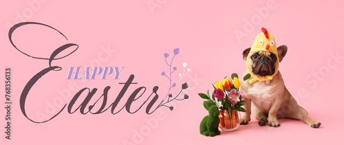 Cute French bulldog in chick hat with beautiful flowers and toy bunny on pink background. Easter celebration © Pixel-Shot
