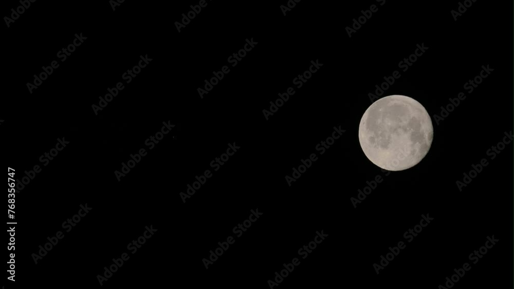 Tokyo, Japan - March 27, 2024: Spica or Maiden and the full moon meet at dawn Tokyo, Japan - March 27, 2024: Spica or Maiden and the full moon meet at dawn