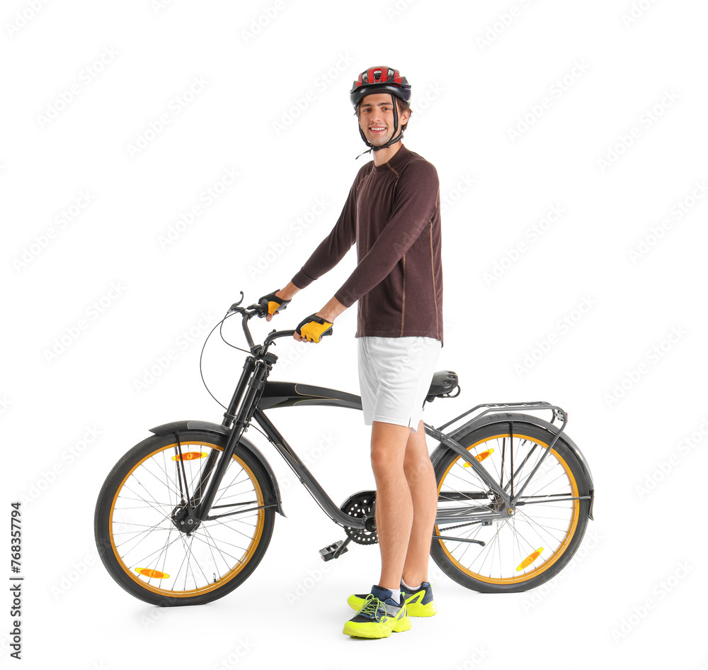 Young male cyclist with bicycle isolated on white background Young male cyclist with bicycle isolated on white background