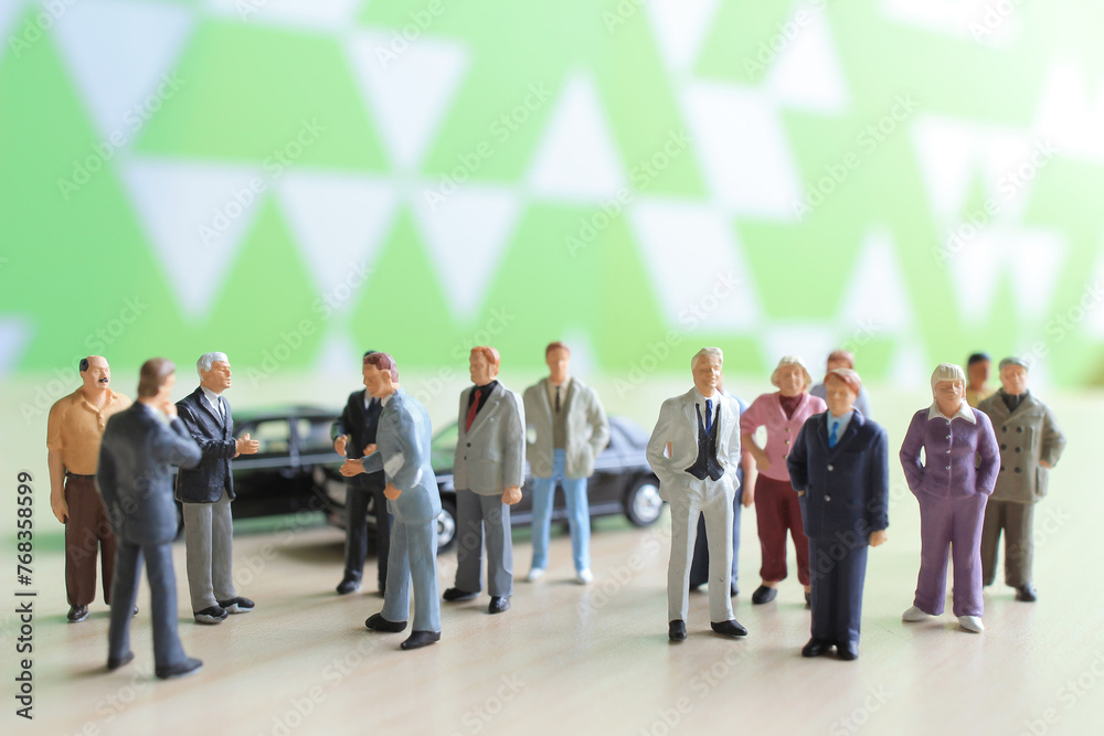 a small figures of business man meeting a small figures of business man meeting