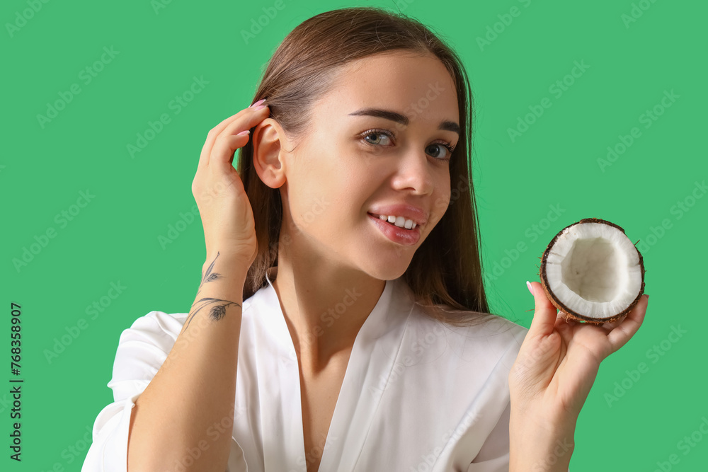 Beautiful young woman with coconut on green background, closeup Beautiful young woman with coconut on green background, closeup