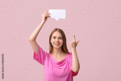 Pretty young woman pointing...