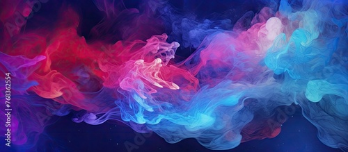 Vibrant swirls of colorful smoke creating an abstract pattern on a dark black background