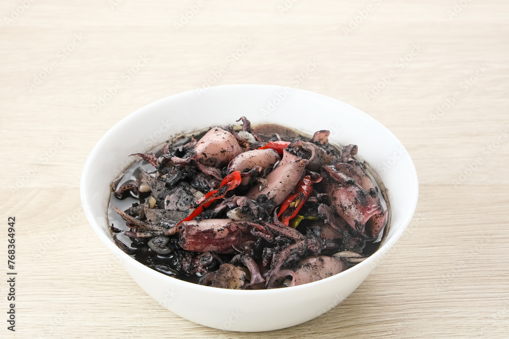 Squid Black Soup (Tumis Cumi Hitam) or stir-fried squid in black ink, Indonesian traditional food
Squid Black Soup (Tumis Cumi Hitam) or stir-fried squid in black ink, Indonesian traditional food