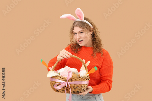 Young woman with bunny ears...