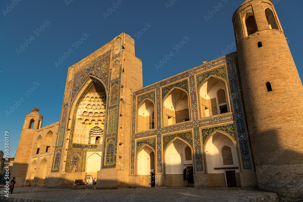 View of the dome and tower of Poi Kalon Mosque in Bukhara, Uzbekistan.