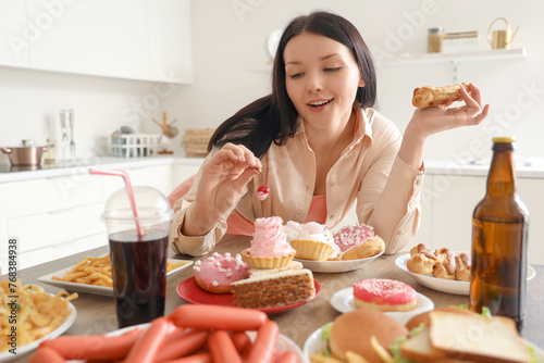 Young woman at table with u...