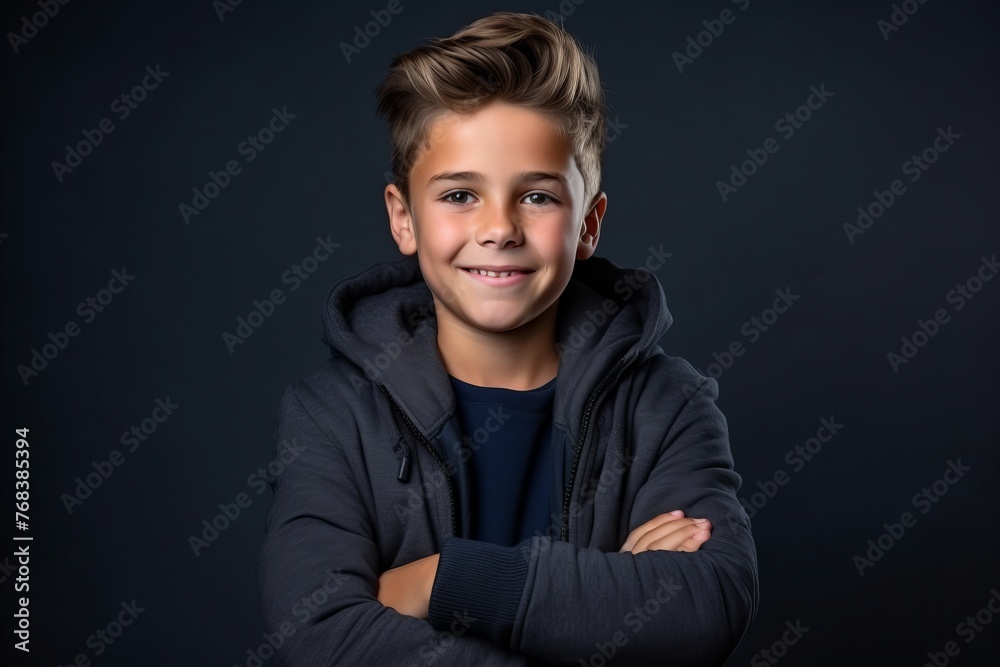 Portrait of a handsome boy on a dark background. Kids fashion. Portrait of a handsome boy on a dark background. Kids fashion.