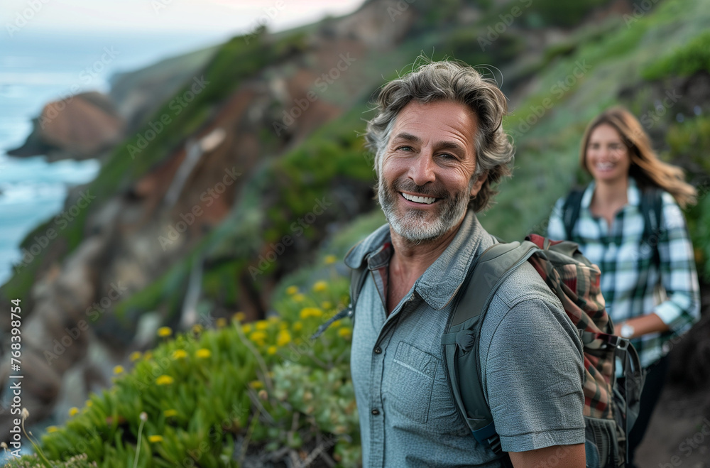 Senior Partners Smiling on Coastal Hike