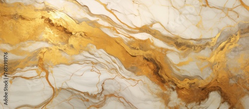 Close-up view of a glossy marble surface meticulously detailed with shimmering gold paint