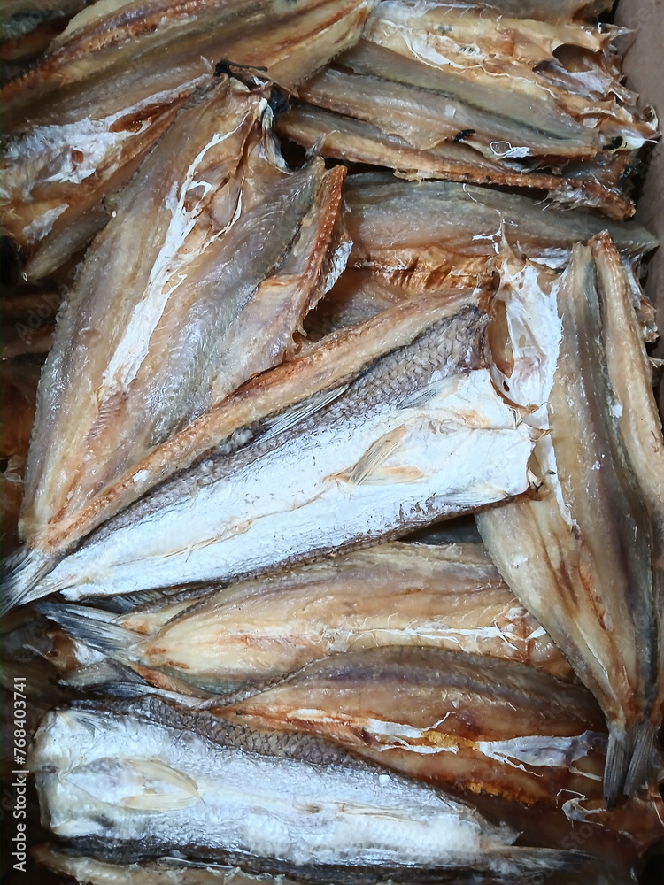 Sun-dried fish in market, Processing sea fish to preserve food for a long time by drying it in the sun Sun-dried fish in market, Processing sea fish to preserve food for a long time by drying it in the sun