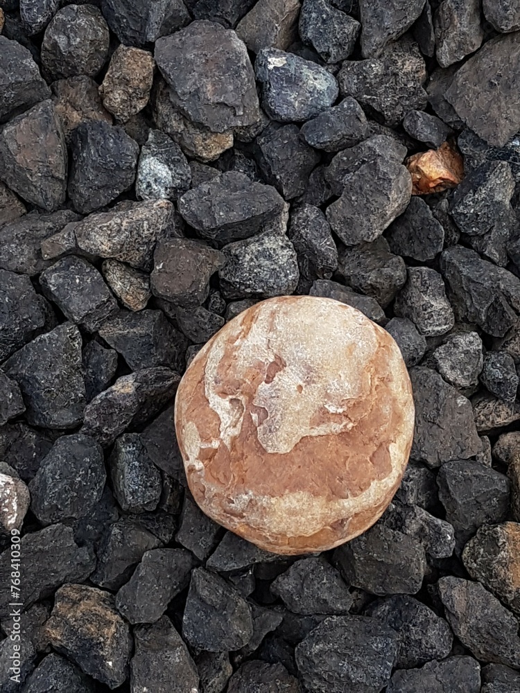 abstract Textured background with round pebble stones. Vacation holiday recreation on beach concept. High quality photo. Fragment with a texture of rock. surface stone wall with cracks. abstract Textured background with round pebble stones. Vacation holiday recreation on beach concept. High quality photo. Fragment with a texture of rock. surface stone wall with cracks.