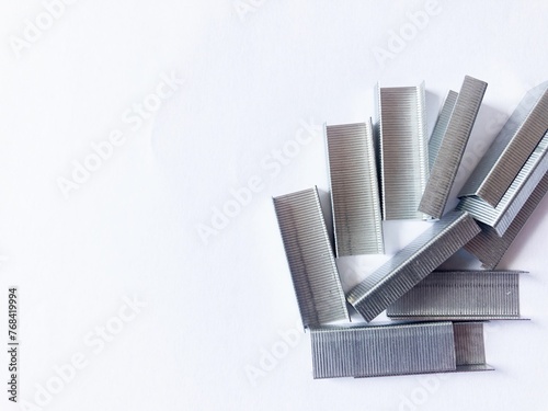 Wallpaper Mural Stapler, hand and box of staples on white background. Torontodigital.ca