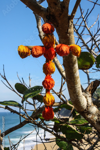 Pom-pom covered cross, Playa Las Cuevas, Sayulita, Nayarit, Mexico © sarah