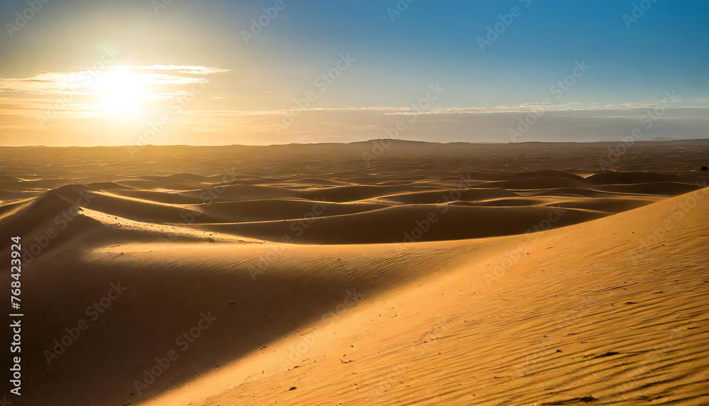 Desert at dusk. Sunset over a vast desert area.