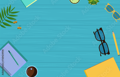 Office Supplies on Work Table with Copy Space on Blue Wooden Background